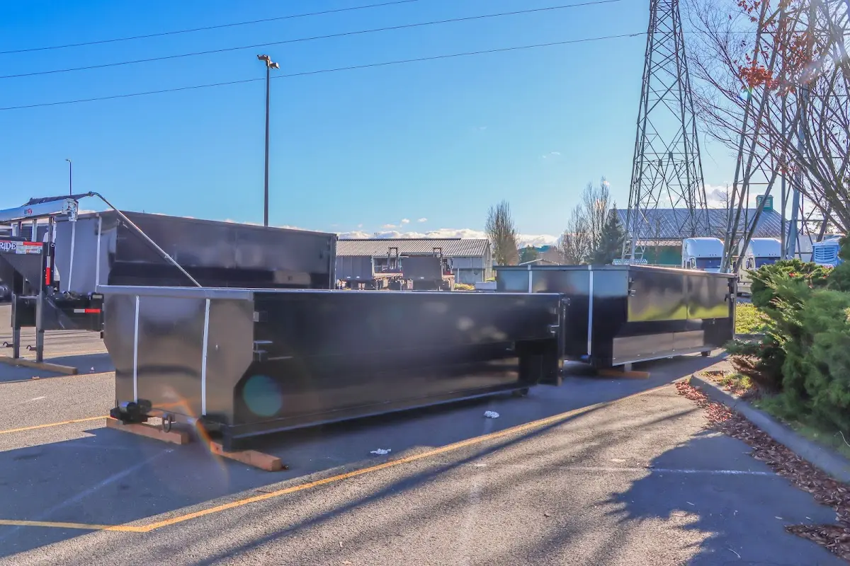 Roll-off dumpster ready for waste disposal at job site for 12 Yard Dumpster Rental in Natchitoches